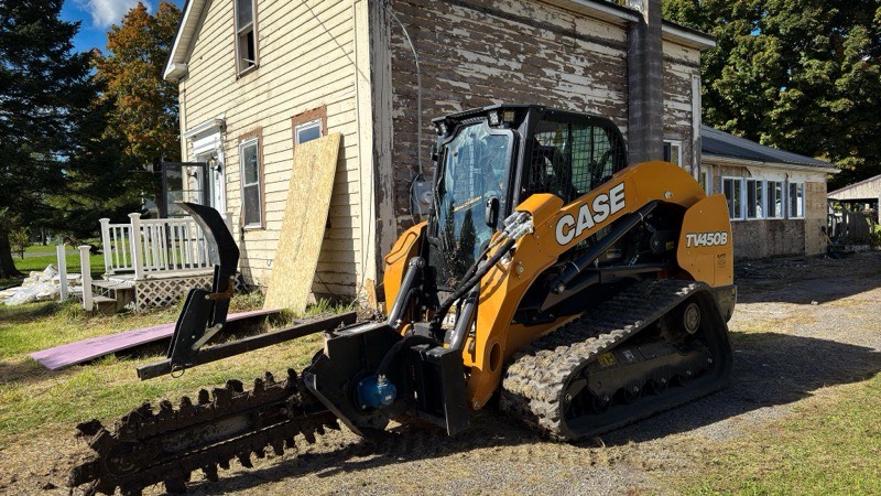 Demolition project with excavator removing commercial structure in Auburn NY