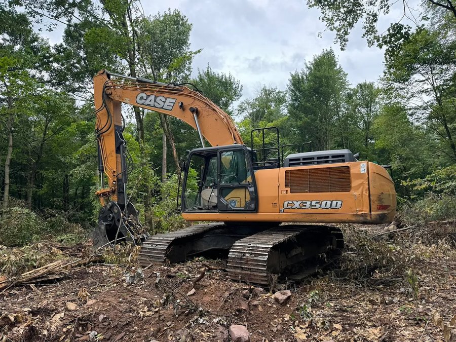 CASE CX350D excavator on solar site work