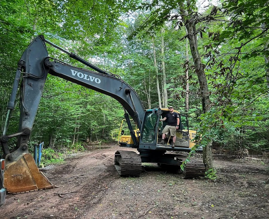 Civil clearing crew on solar corridor