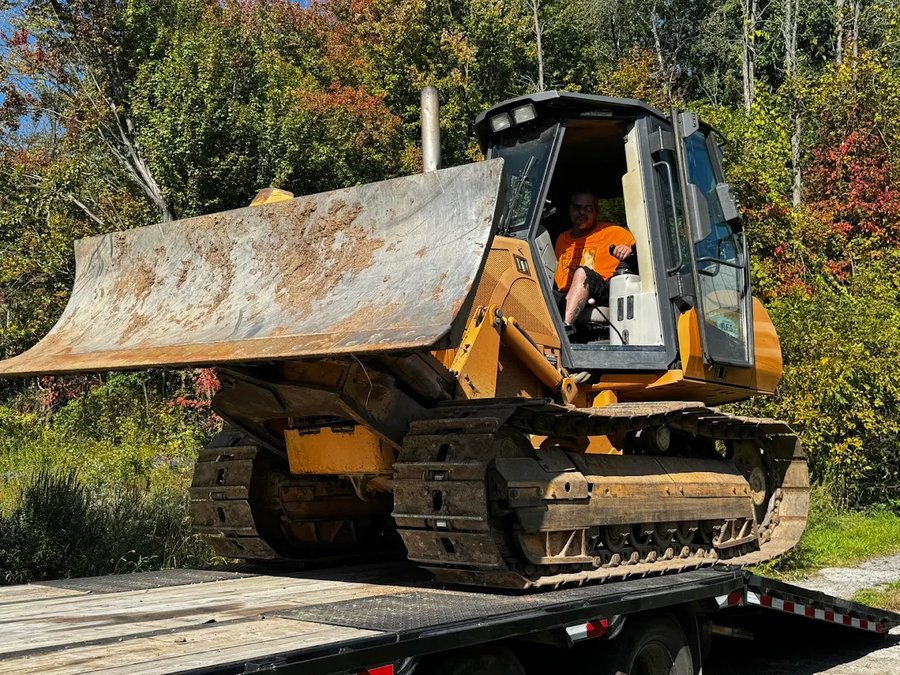 Track loader at an autumn site-work job